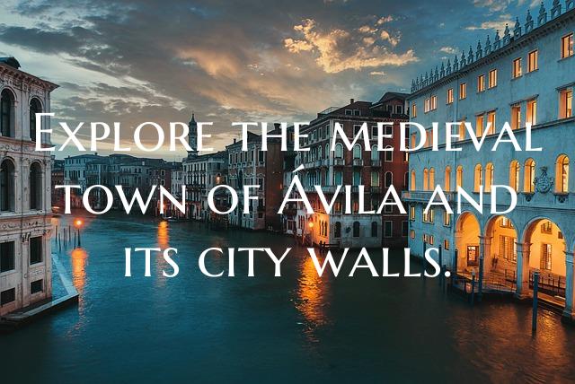 Explore the medieval town of Ávila and its city w...